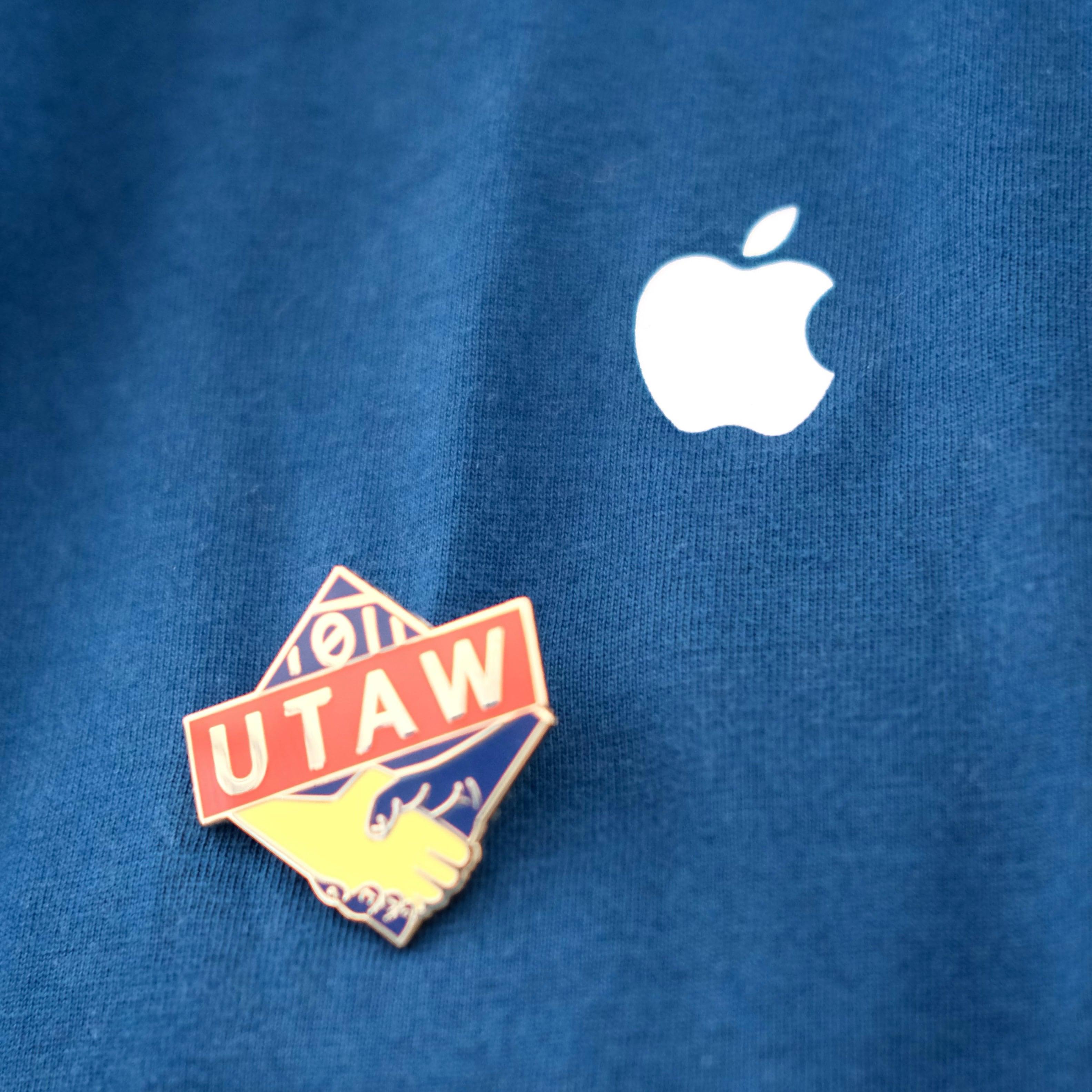 United tech and allied workers badge next to the apple logo